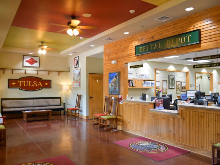 Central Tulsa's dental clinic waiting room and reception area with train themed signage