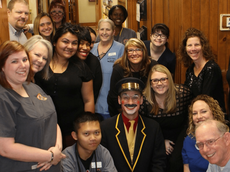 The Central OKC Dental team with Smiley