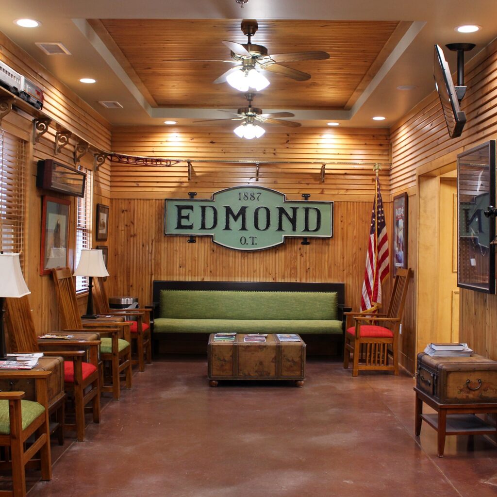 Wide shot of the interior of the Edmond dental clinics waiting room and reception area.