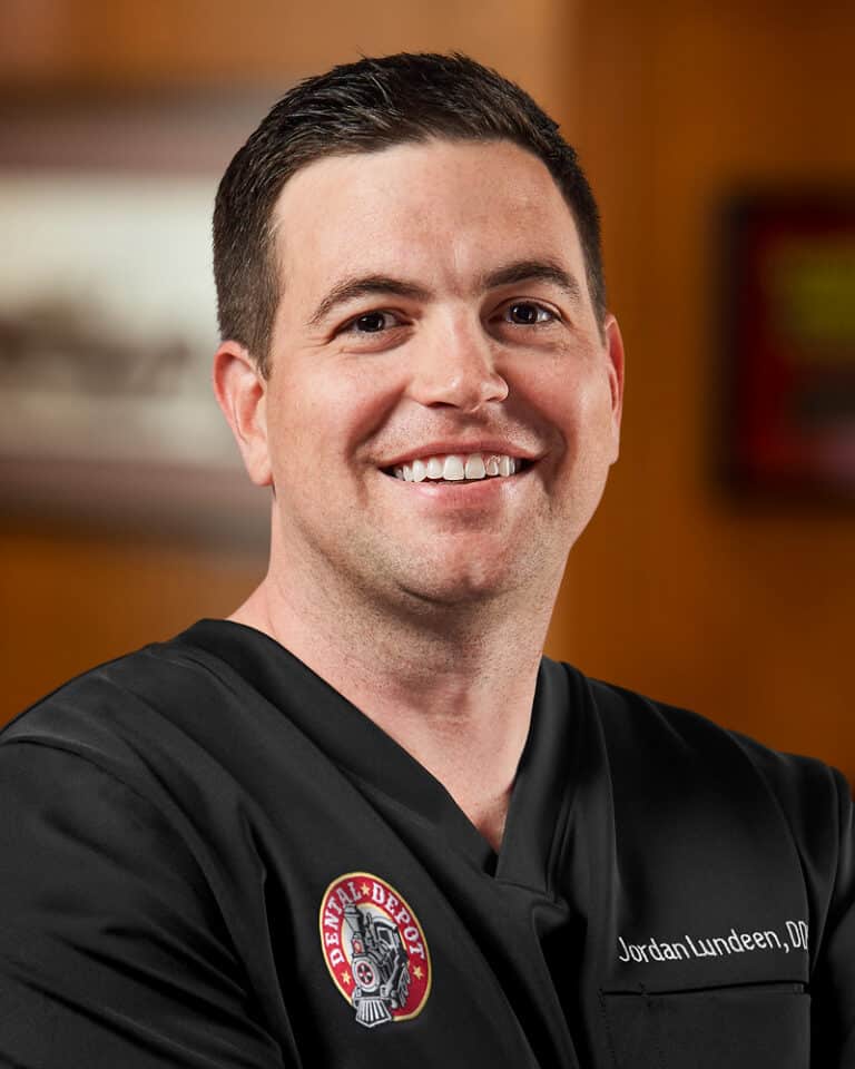 Head shot for Dr. Jordan Lundeen, dentist at Dental Depot in OKC.