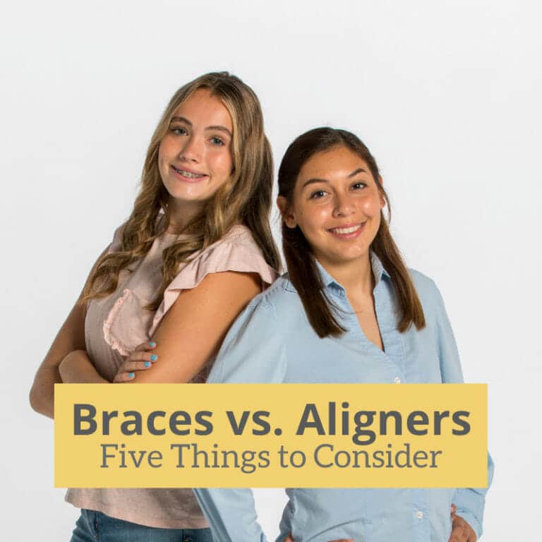 Two Girls posing for braces vs aligners