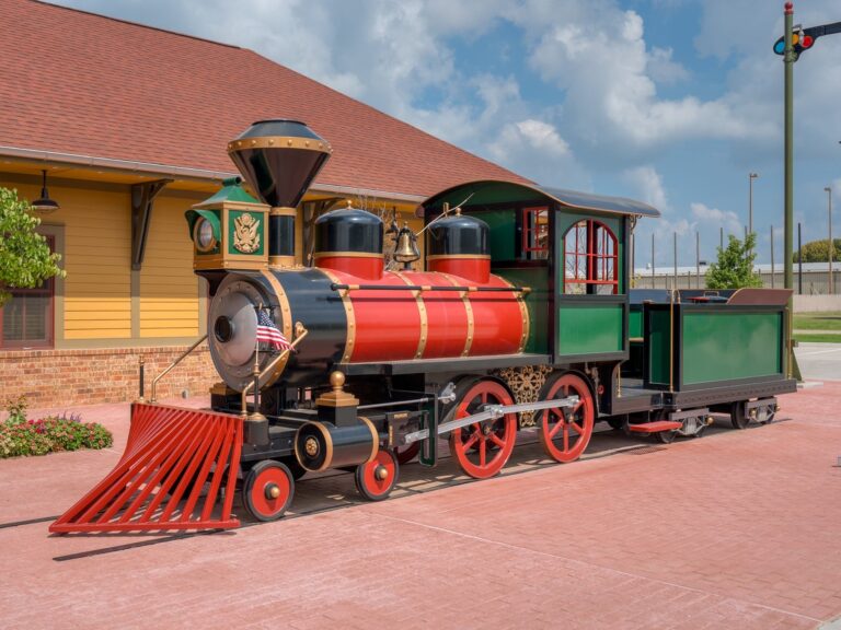 A view of the model train on a sunny day at Dental Depot's West Oklahoma City dental clinic